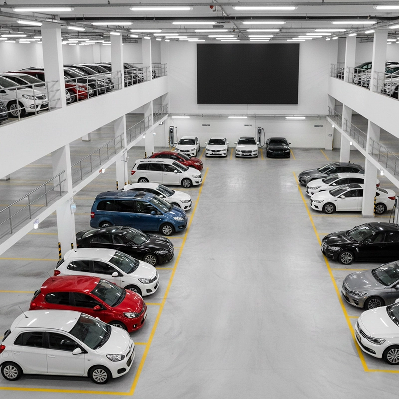 Car models parked in warehouse available for car rental delivery to home